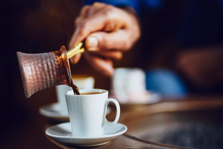 turkish coffee being made in a traditional way